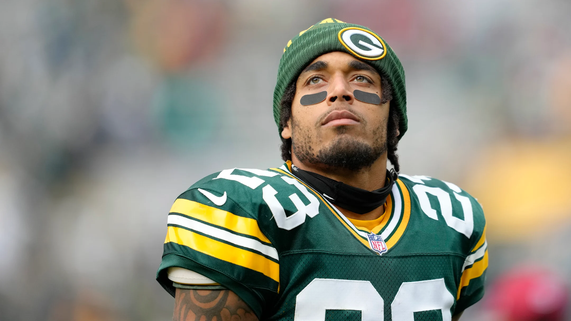 Jaire Alexander walks off the field after a game, marking the emotional moment tied to Jaire Alexander's exit from Green Bay Packers