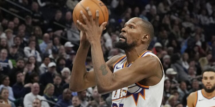 Kevin Durant rising for his signature mid-range jumper over a defender