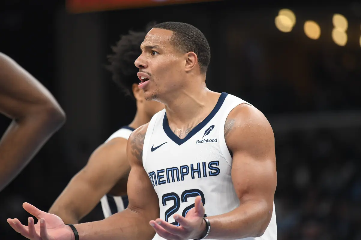 Desmond Bane wearing Memphis Grizzlies jersey with a shocked expression during a tense in-game moment